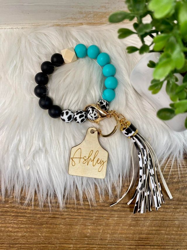Cow tag wristlet